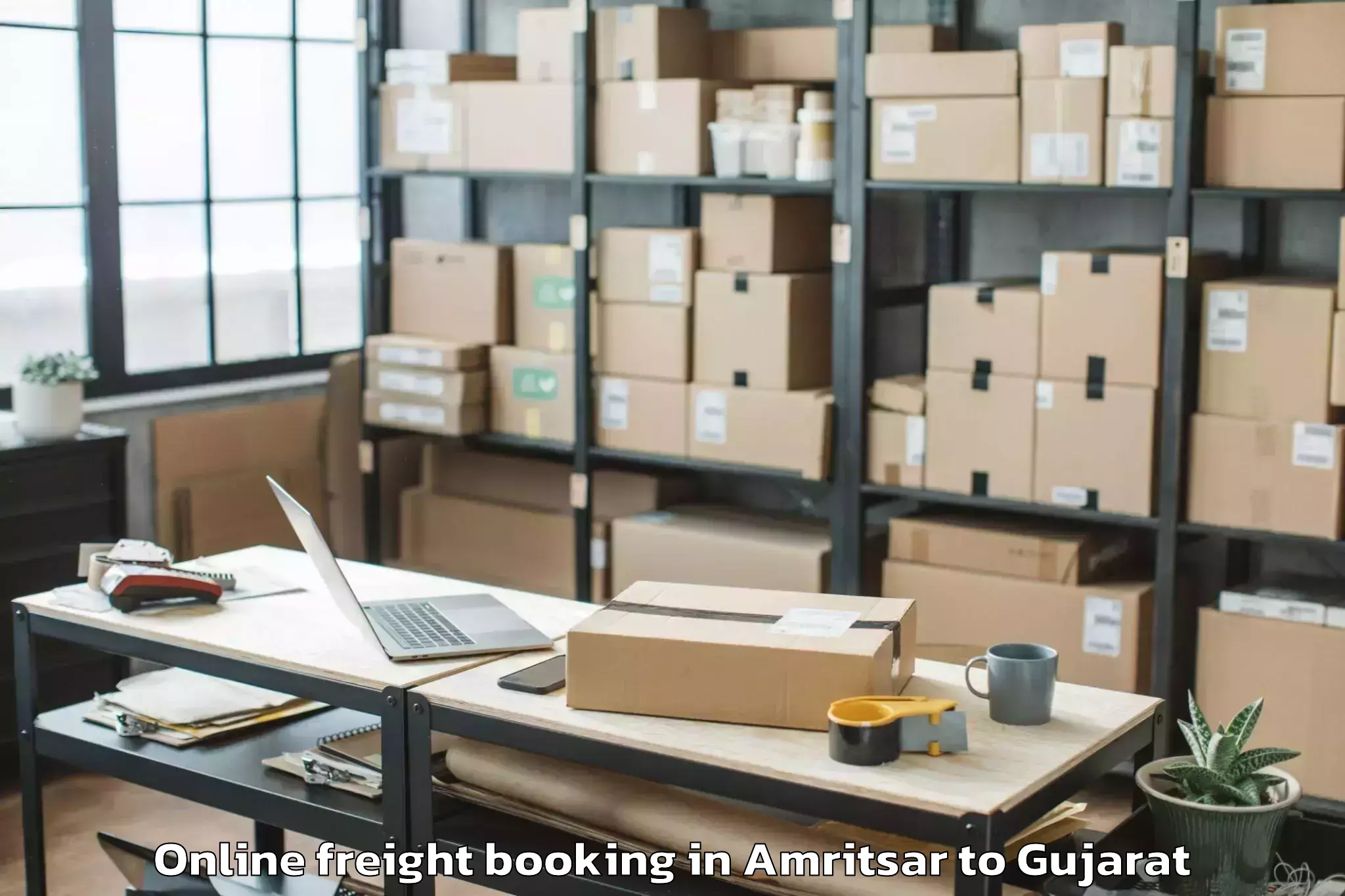 Top Amritsar to Gadhada Online Freight Booking Available